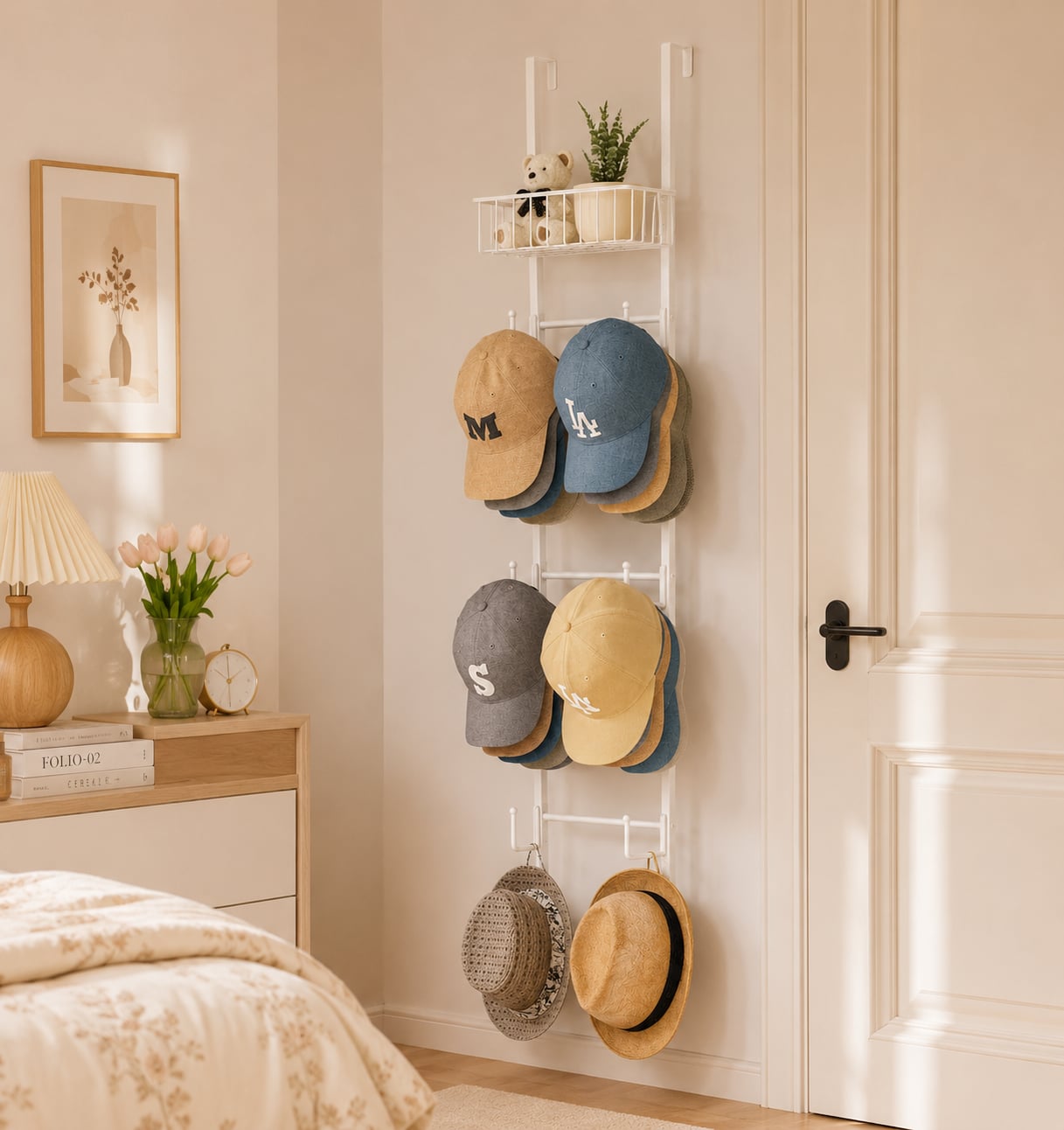 Metal over-the-door hat rack with six hooks hanging over a white door